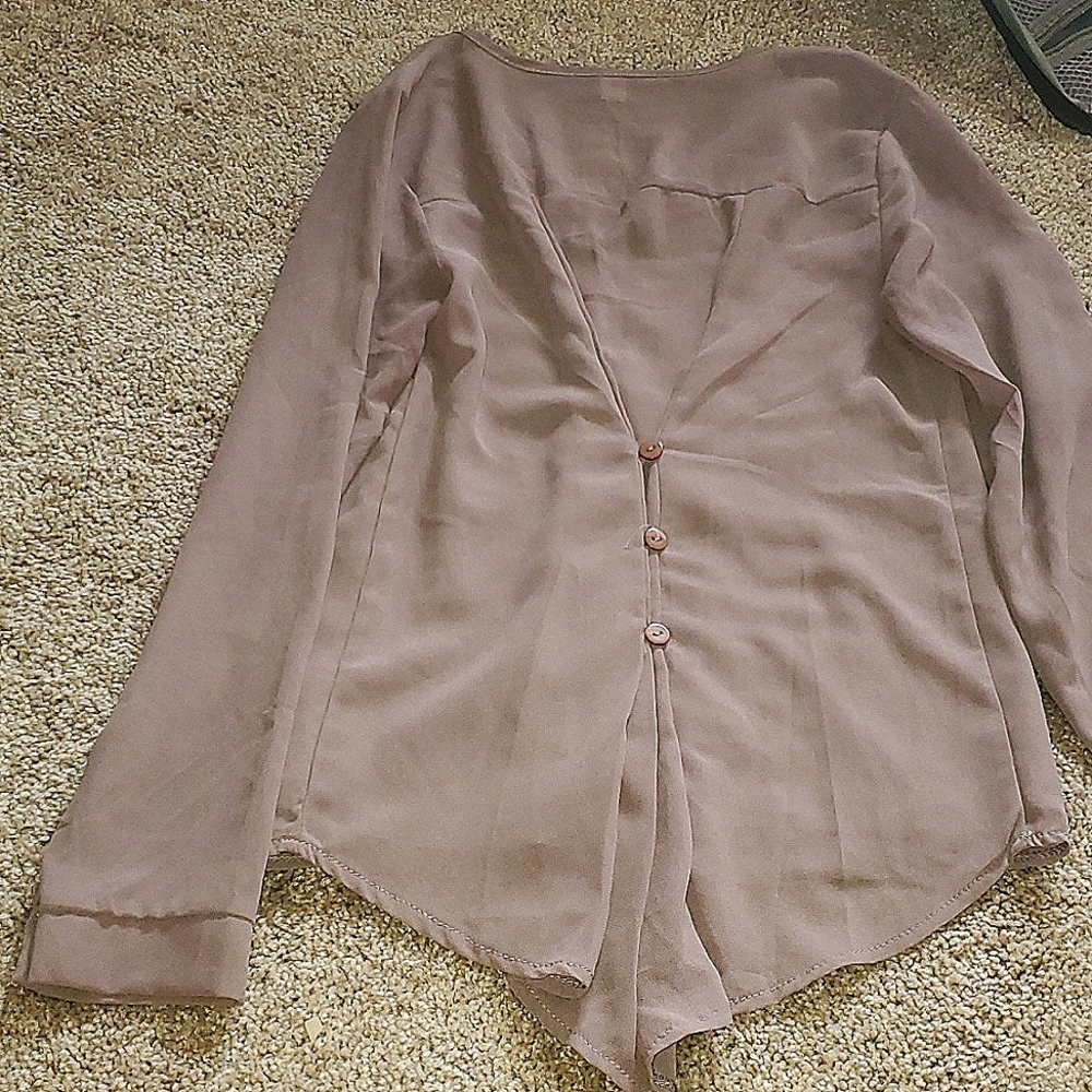 Beautiful long sleeve blouse with detailed back